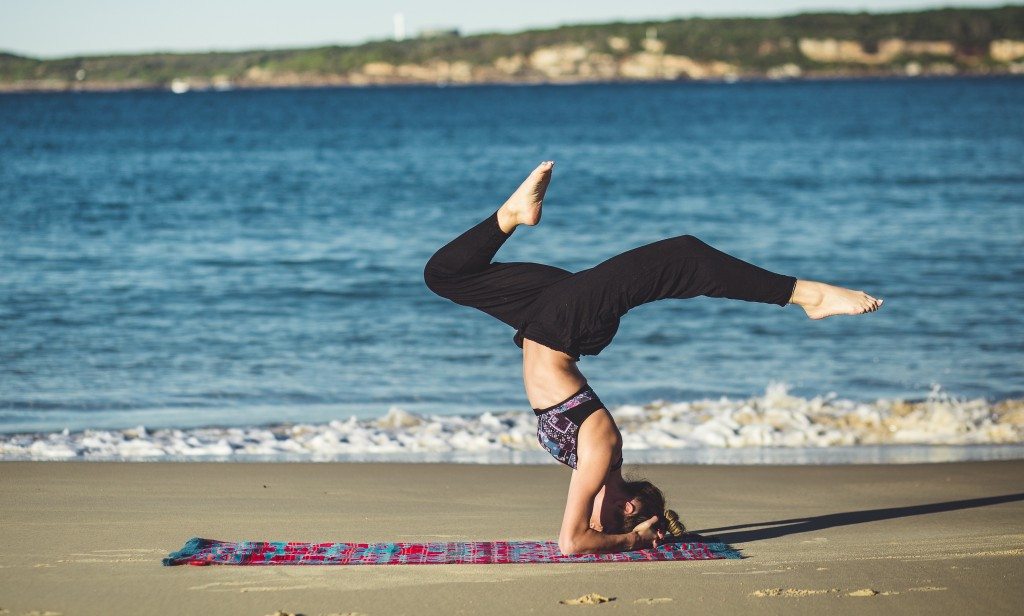 Woman Practicing Yoga by Matthew Kane on Unsplash