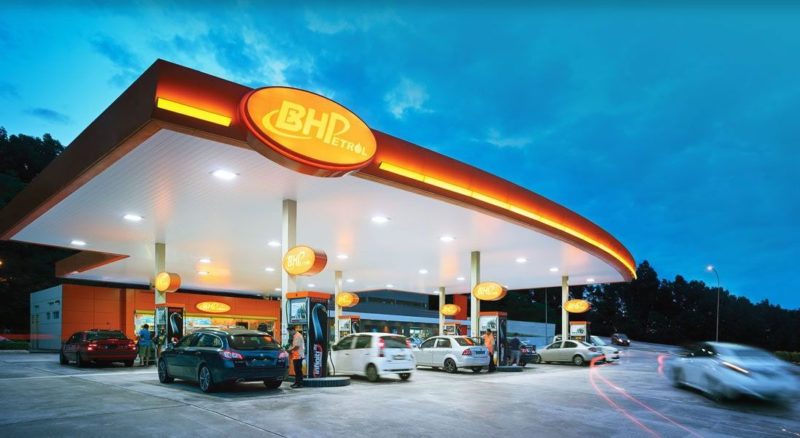 BHPetrol service kiosk in the evening with the cars getting fuel filled