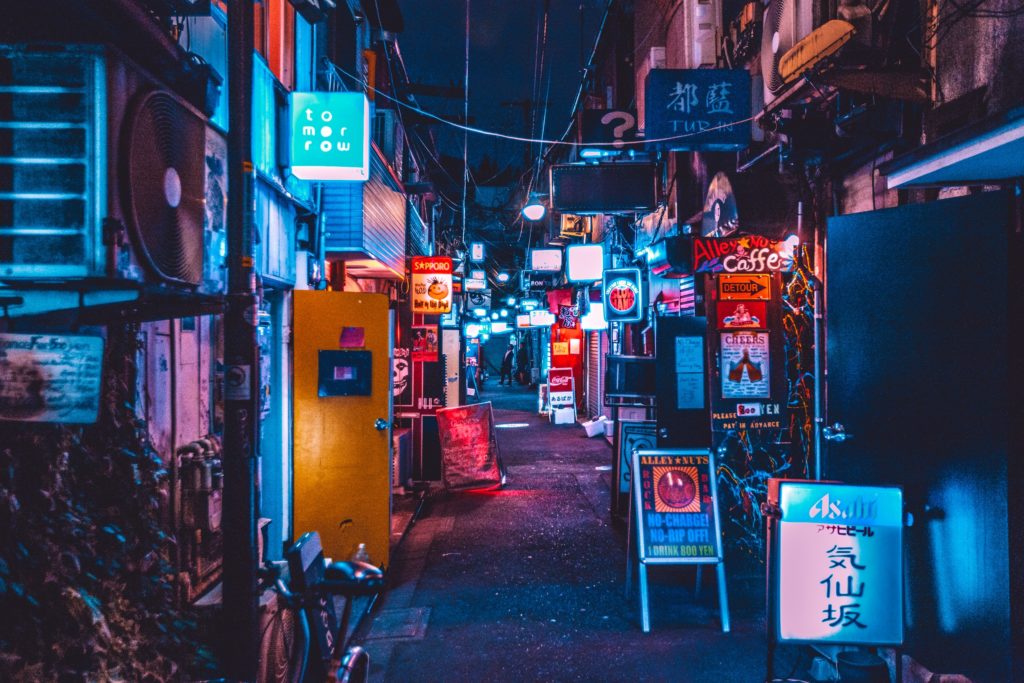 japan street at night with neon signs