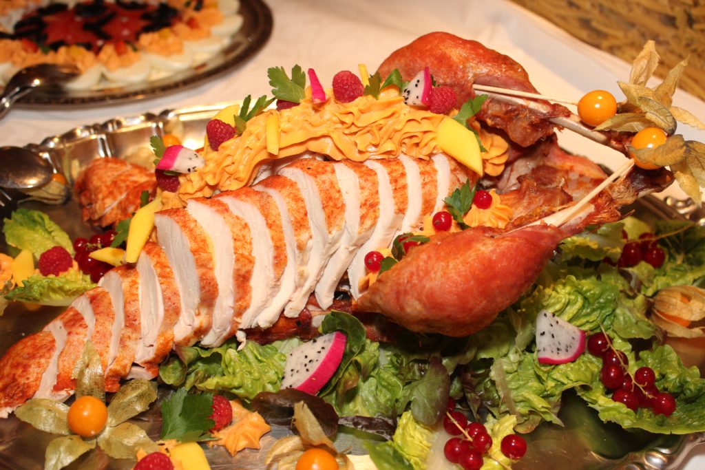 Sliced meat platter with salad on side 