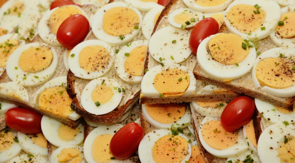 Platter of egg salad with cherry tomatoes