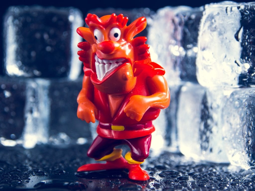 red toy in front of ice blocks for new years eve party