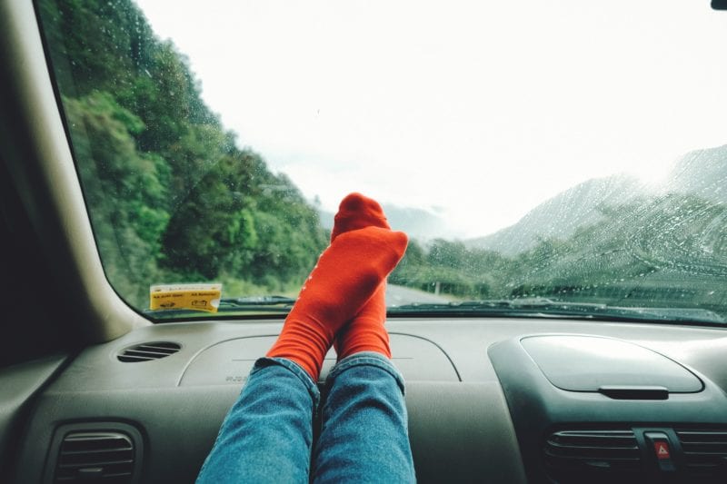 road trip socks on dashboard