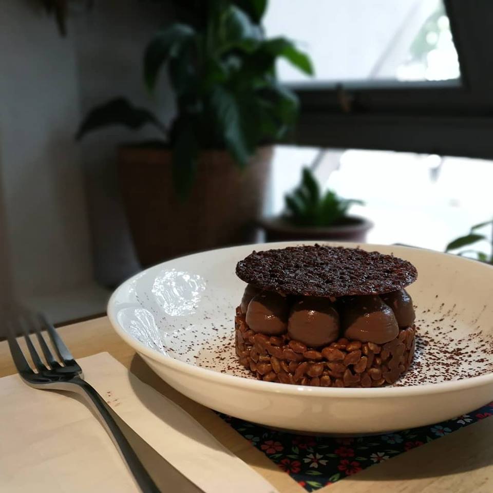 hazelnut crackle on white plate with fork and napkin on side