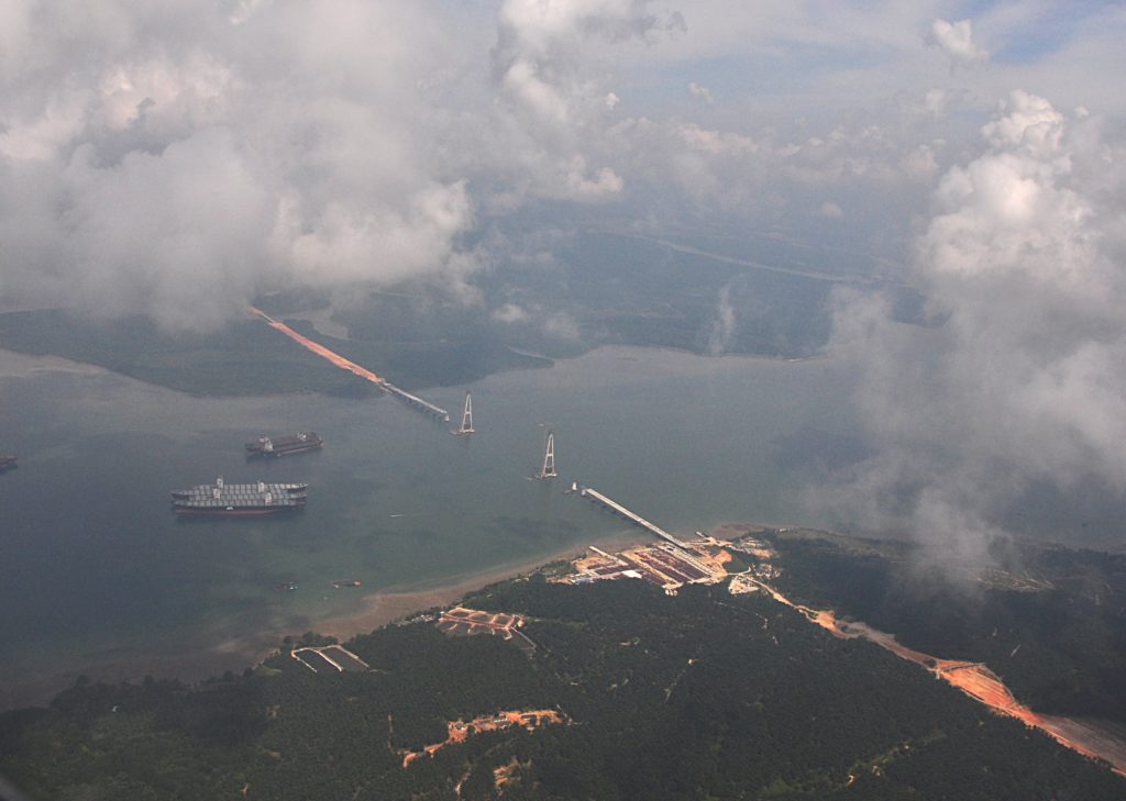 Aerial view of Sg. Johor Bridge surrounded by clouds