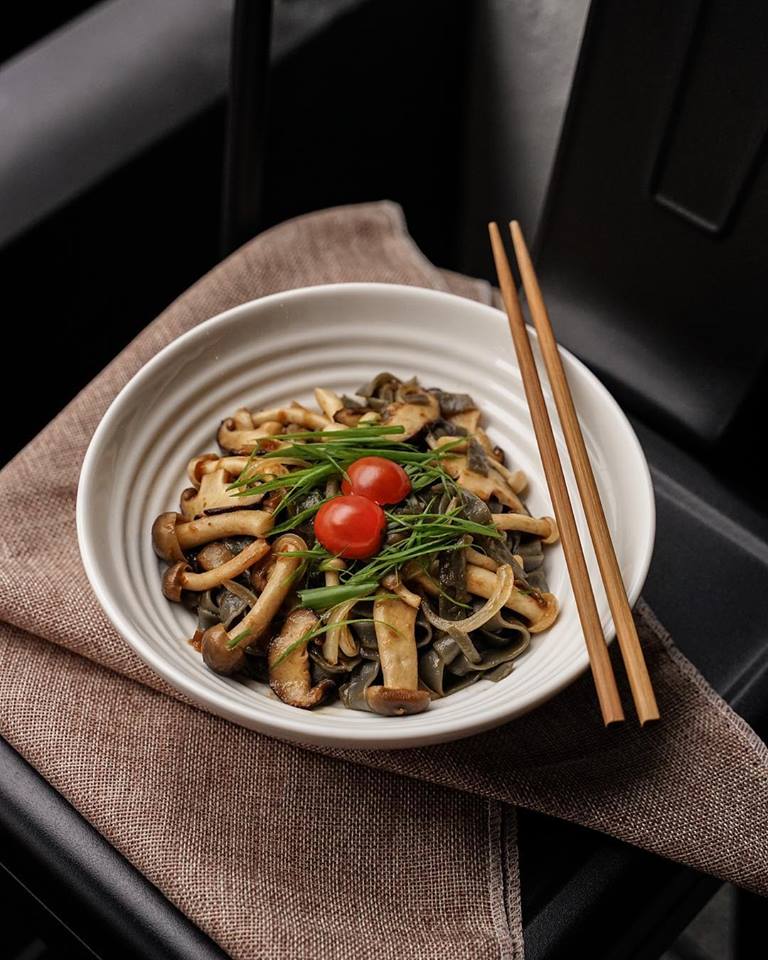 Mushroom Ramen in bowl with chopsticks placed on side