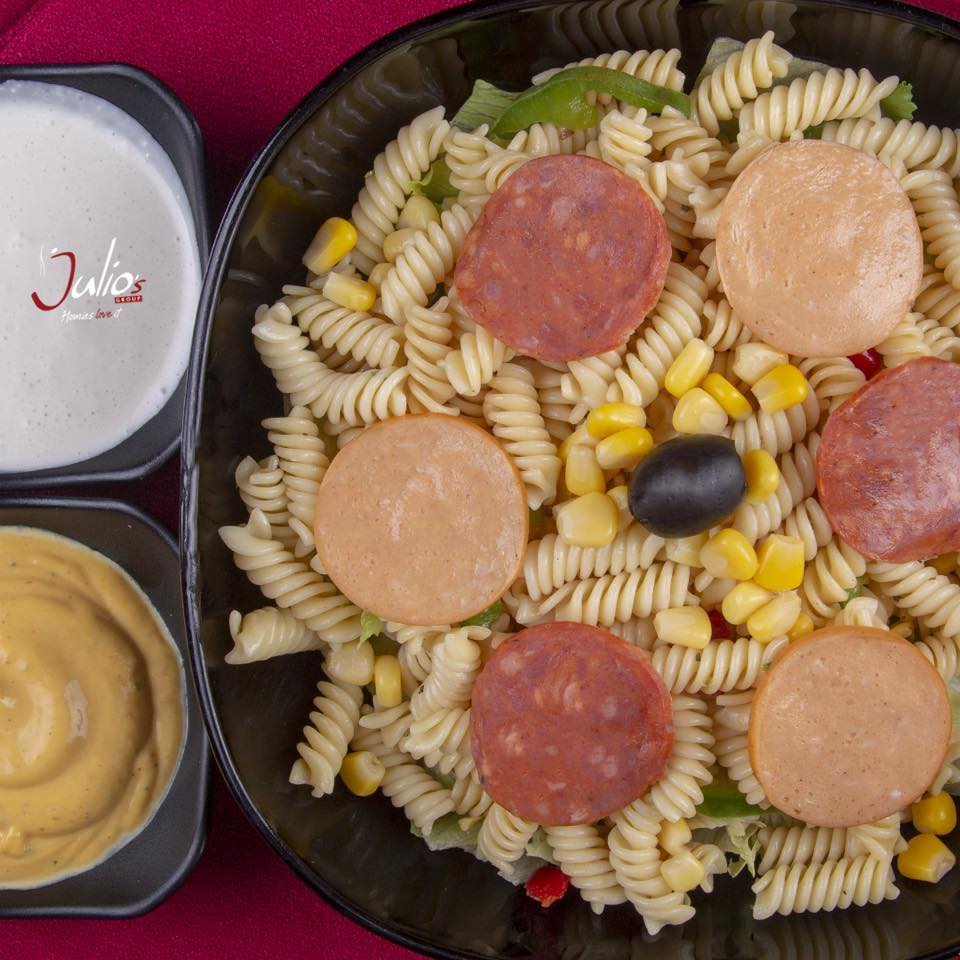 Pasta salad served with sauces on side