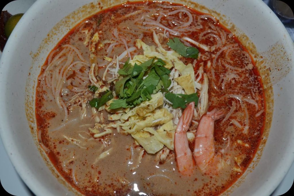 Sarawak Laksa in thick gravy with prawns on top