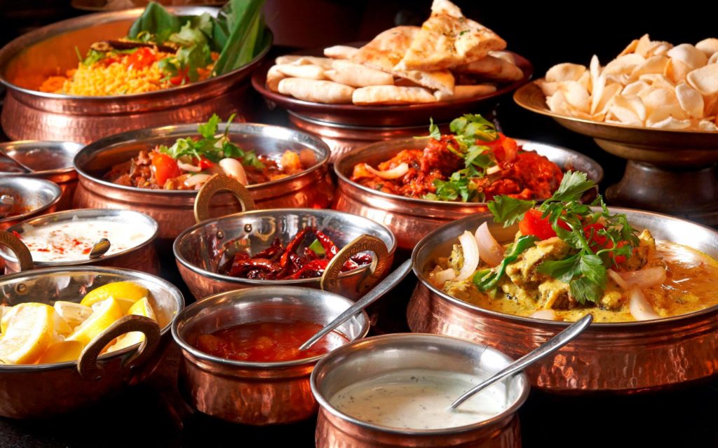 Buffet spread of curries and Indian breads