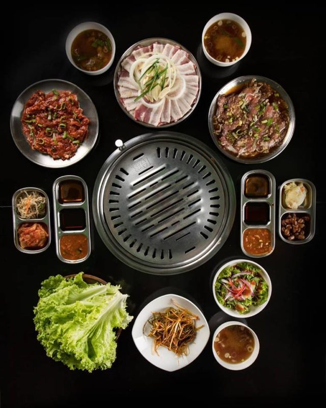 grill pan with korean style meat and side dishes