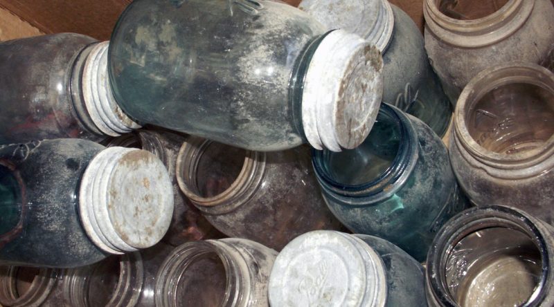 Dusty, colorful empty jars
