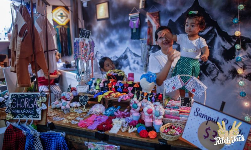 Mother and child at their crochet stall at the Rilek Jack Market