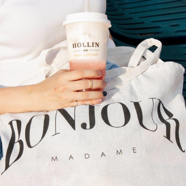 canvas bag with french lettering and milk tea