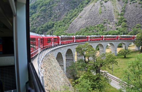 red train in the mountains
