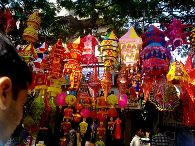 traditional Indian lanterns hung up on trees