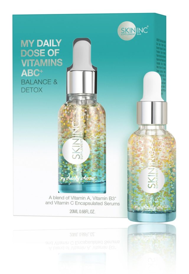 Skin Inc. gradient bottle of vitamin skincare serum to combat acne
